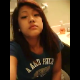 An Asian-American girl video-records herself straining and grunting while taking a shit. Some farts and plops are heard along with her theatrics.